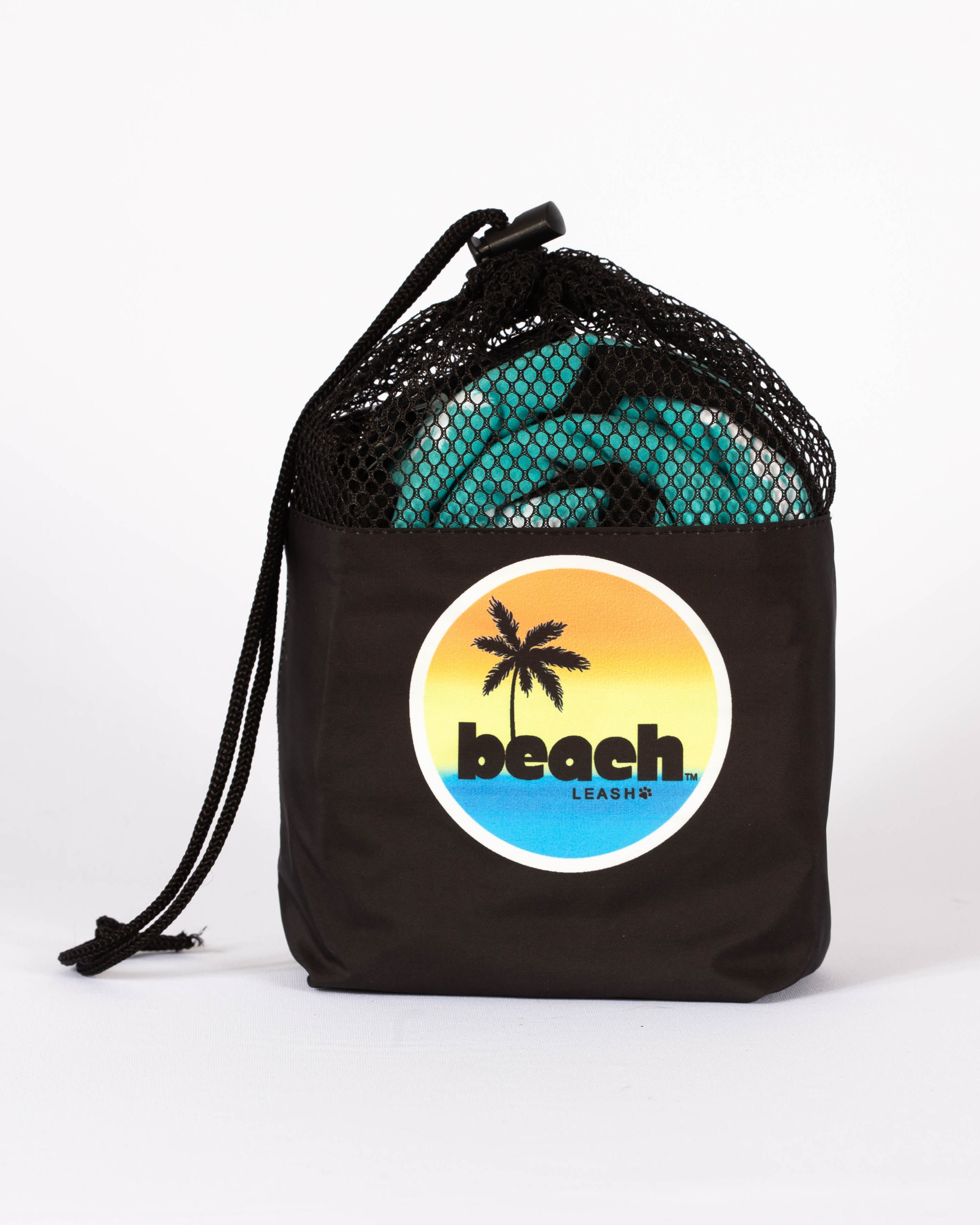 Black mesh drawstring bag with 'Beach Leash' logo and a Beach Leash rolled up inside. 