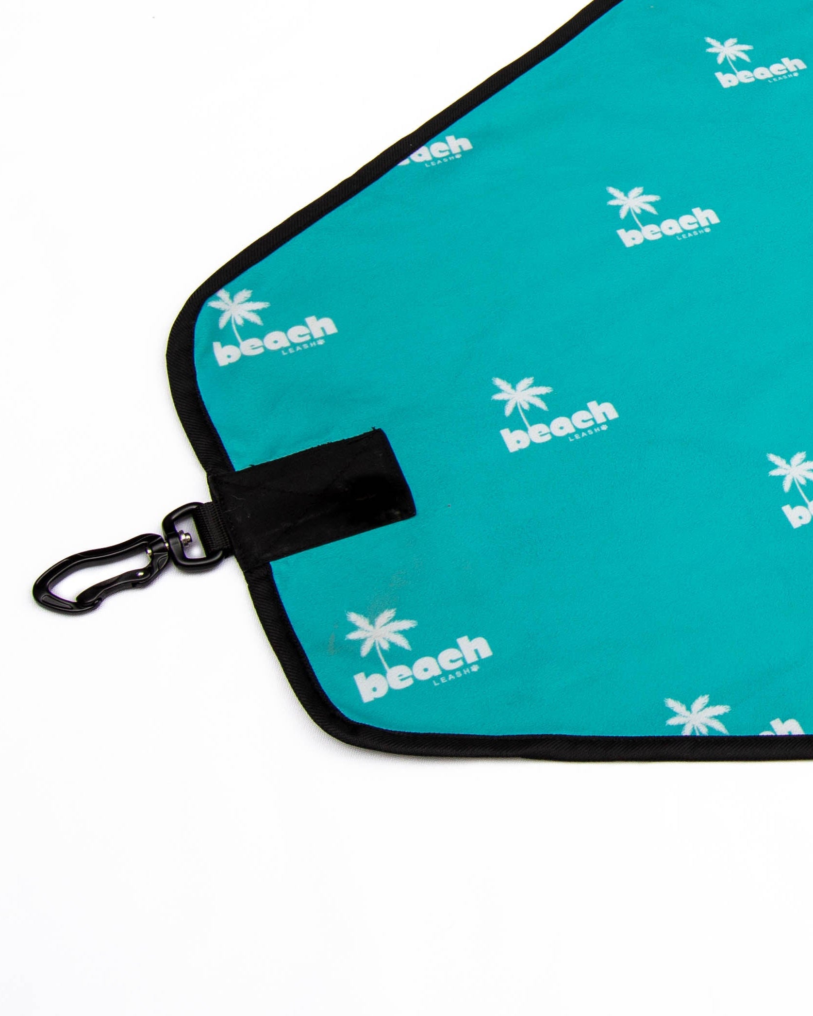 Close up of back side of Beach Leash wiht carabiner hook.